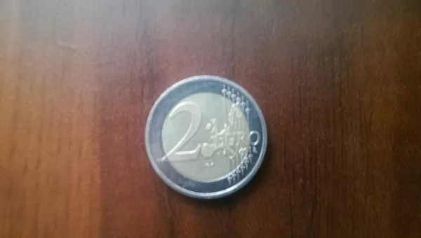 продам монеты: 2 евро-2002 года,  1 рубль 1977 г.в. олимпиада - 80